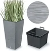 A tall, square planter with a textured gray finish and a green plant inside, shown next to a separate gray plastic insert. A close-up of the planter's texture is also visible. Voir les images du produit