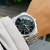 A close-up shot of a man's wrist wearing a silver Casio watch with a black dial. Produktbild-Vorschau