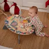A baby playing with a wooden activity table. Podgląd zdjęcia produktu