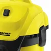 A close-up view of a yellow and black Kärcher vacuum cleaner part, showing a switch and a logo. Produktbild-Vorschau