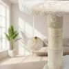 A close-up view of a cat tree with a dangling toy ball. Podgląd zdjęcia produktu