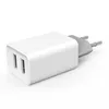 A white dual USB wall charger with European plug prongs. Produktbild-Vorschau
