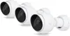 Three white security cameras are arranged in a diagonal line against a white background. Produktbild-Vorschau