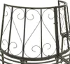 A close-up view of the curved metal backrest of a tree bench. Náhled obrázku produktu