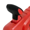 A close-up view of a red and black handle on a tool. Produktbild-Vorschau