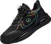 A black work shoe with orange and cyan accents. Produktbild-Vorschau