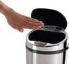 A hand is shown activating the sensor of a stainless steel trash can, causing its lid to open. Produktbild-Vorschau