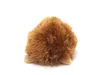 A brown, fluffy toy hedgehog seen from the back, with its feet visible at the bottom. Produktbild-Vorschau