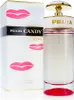 A bottle of Prada Candy Kiss Eau de Parfum and its packaging are displayed against a white background. Anteprima dell’immagine prodotto