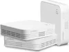 Three white electronic devices stacked and arranged on a white background. Náhled obrázku produktu