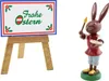 Ein fröhlicher Osterhase mit Pinsel und Palette steht neben einem Schild mit der Aufschrift Frohe Ostern das auf einer Staffelei präsentiert wird Produktbild-Vorschau