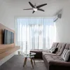 A modern living room with a couch, TV, and ceiling fan. Produktbild-Vorschau
