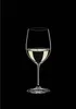 A single glass of white wine against a black background. Náhľad obrázku produktu