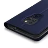 A close-up view of a dark blue flip case for a smartphone, showing the camera module and part of the case's interior. Produktbild-Vorschau