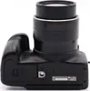 A side view of a black Canon PowerShot digital camera. Produktbild-Vorschau