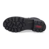 The sole of a black boot is shown against a white background. Produktbild-Vorschau