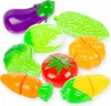 A collection of plastic toy vegetables arranged on a white background. Náhled obrázku produktu