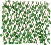 A close-up view of a wooden lattice fence covered with artificial green leaves. Náhled obrázku produktu