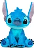 A plush toy of the Disney character Stitch is sitting and facing the camera. Podgląd zdjęcia produktu