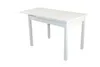 A white dining table with an extension leaf is shown from a slightly elevated side angle against a white background. Produktbild-Vorschau