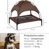 A raised dog bed with a canopy, shown with dimensions and product information for a Miniature Schnauzer. Voir les images du produit