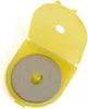 A rotary cutter blade in its yellow plastic case. Produktbild-Vorschau