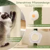 A cat scratching a sisal post next to a cat tree with hanging toys and a flower-shaped perch. Podgląd zdjęcia produktu