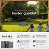 A nest swing in a garden with children playing. Anteprima dell’immagine prodotto