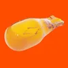 A single automotive light bulb against an orange background. Produktbild-Vorschau