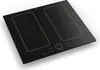 A black induction cooktop with gold trim and digital controls, shown from a high angle on a white background. Produktbild-Vorschau