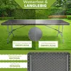A folding garden table shown outdoors on grass, with rain effects on one half of the table and a close-up of water droplets on the other half. Text overlays highlight product features. Anteprima dell’immagine prodotto