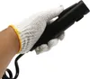 A gloved hand holding a black handle with a black cord attached. Náhled obrázku produktu