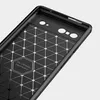 The inside of a black phone case with a geometric pattern. Náhled obrázku produktu