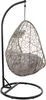 A hanging egg chair with a stand, isolated on a white background. Náhled obrázku produktu