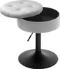 A light gray storage stool with its lid open, revealing a black interior, is shown on a white background. Produktbild-Vorschau