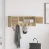 A wall-mounted cabinet with hooks, holding a scarf, keys, and a cap. Voir les images du produit
