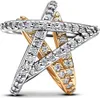 A close-up studio shot of a star-shaped ring with interlocking bands. Podgląd zdjęcia produktu