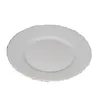 A white plate with a textured rim is shown against a white background. Anteprima dell’immagine prodotto
