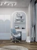 A child's bedroom setup with a desk, chair, and wardrobe. Produktbild-Vorschau