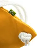 A close-up view of a yellow bag with a white rope handle and a small green tag with a logo. Anteprima dell’immagine prodotto