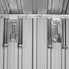Close-up view of the interior of a metal shed, showing the door latch mechanism and the corrugated metal walls and ceiling. Náhľad obrázku produktu