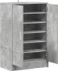 An open shoe cabinet with multiple shelves. Produktbild-Vorschau