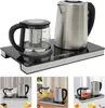 A collage of images showing a tea maker set with an electric kettle and a glass teapot with an infuser, placed on a heating base with a touch control panel. The collage also includes smaller images of the tea set in use with tea, and a slice of cake and so Podgląd zdjęcia produktu