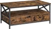 A coffee table with a rustic wood finish and black metal frame, featuring two drawers and an open shelf. Produktbild-Vorschau