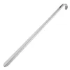 A long, thin, metallic shoehorn is shown against a white background. Podgląd zdjęcia produktu
