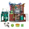 A detailed toy playset depicting a multi-level building with various rooms and accessories. Produktbild-Vorschau