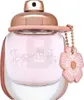 A close-up studio shot of a Coach Floral Eau de Parfum bottle. Voir les images du produit