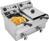 A commercial deep fryer filled with french fries. Voir les images du produit