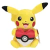 A plush Pikachu toy holding a heart-shaped Poke Ball. Anteprima dell’immagine prodotto
