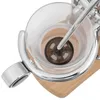 A close-up view of the top of a siphon coffee maker, focusing on the extraction mechanism. Náhled obrázku produktu